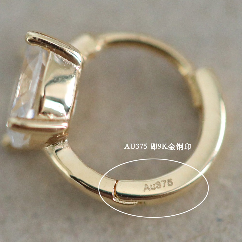 9K gold oval diamond ear buckles