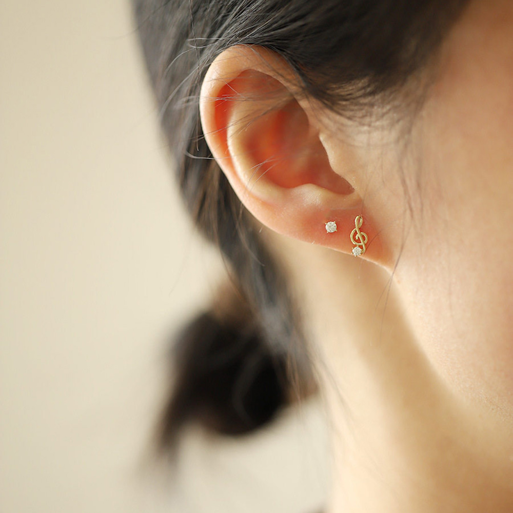 9K gold diamond-encrusted note stud earrings