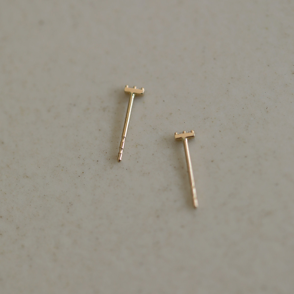 14K gold two-diamond stud earrings