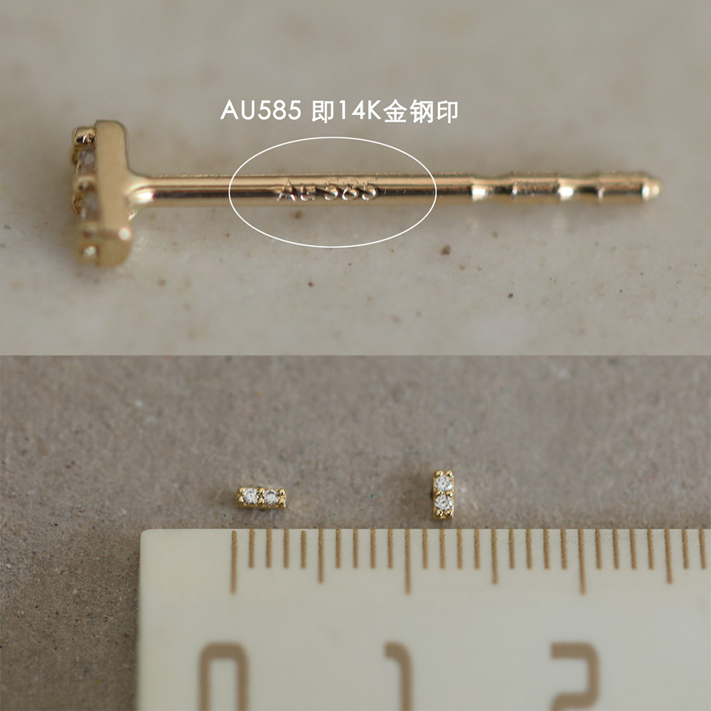 14K gold two-diamond stud earrings