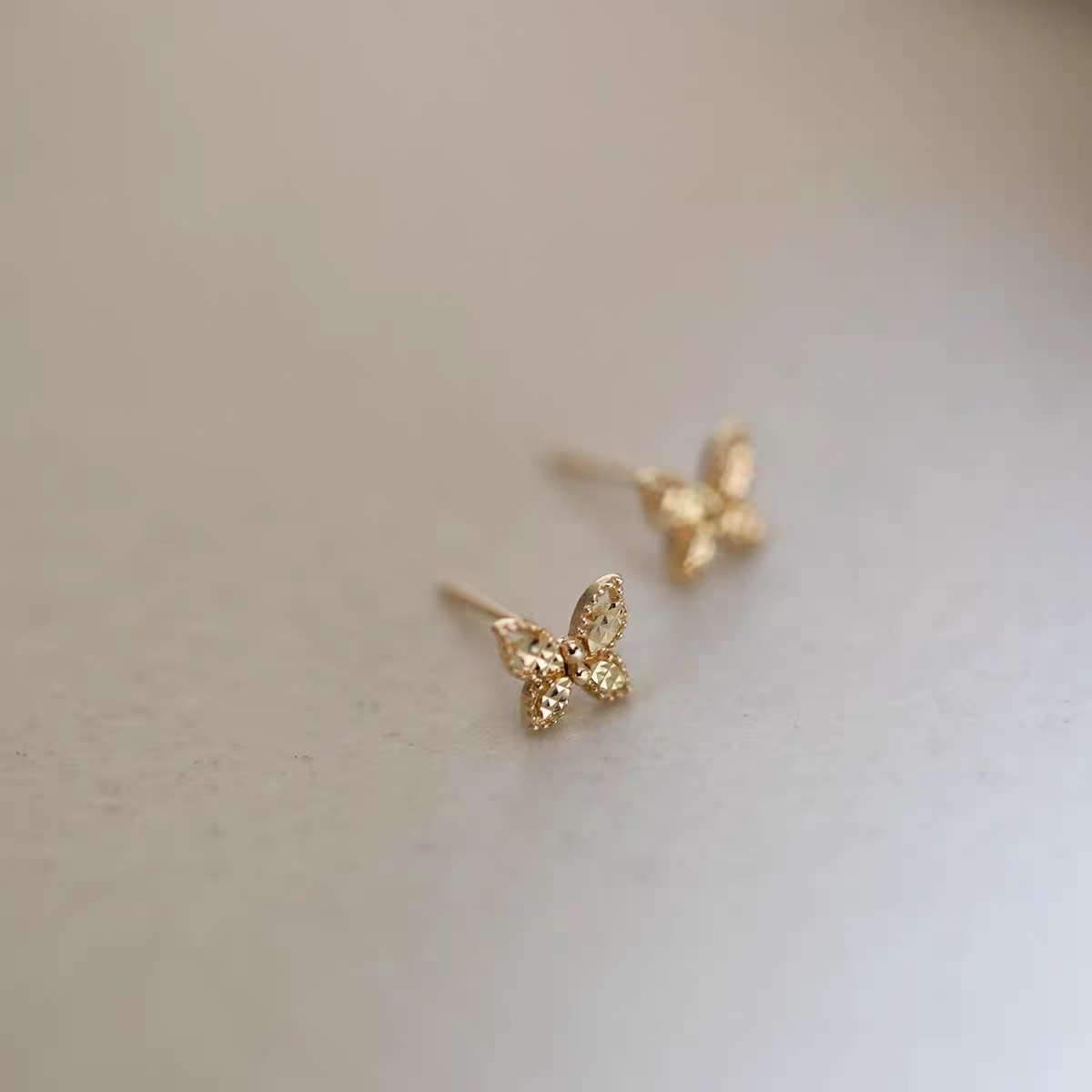 9K gold clear cold hollow carvings butterfly stud earrings